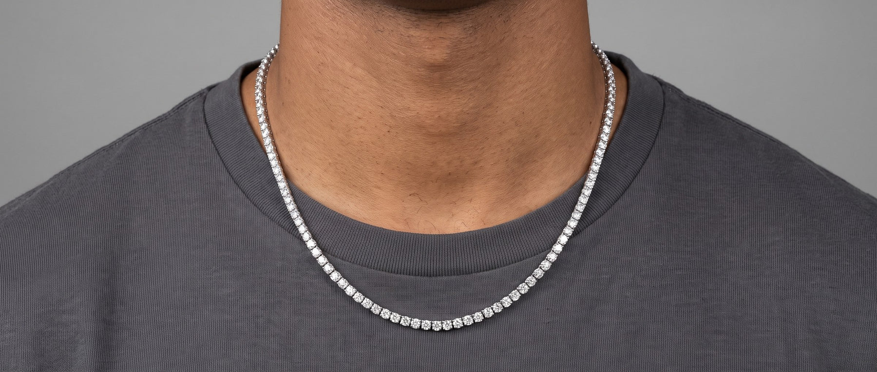 Moissanite chains from Jamilah Jewels, worn at the neck