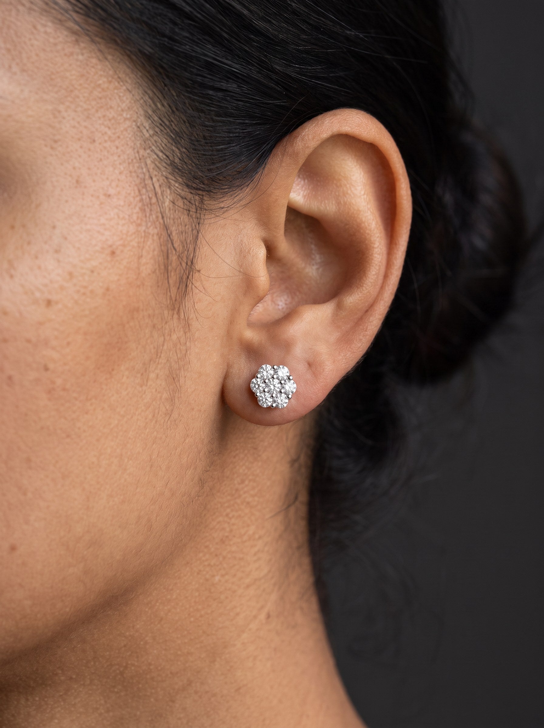 A 9mm moissanite stud shown on the ear