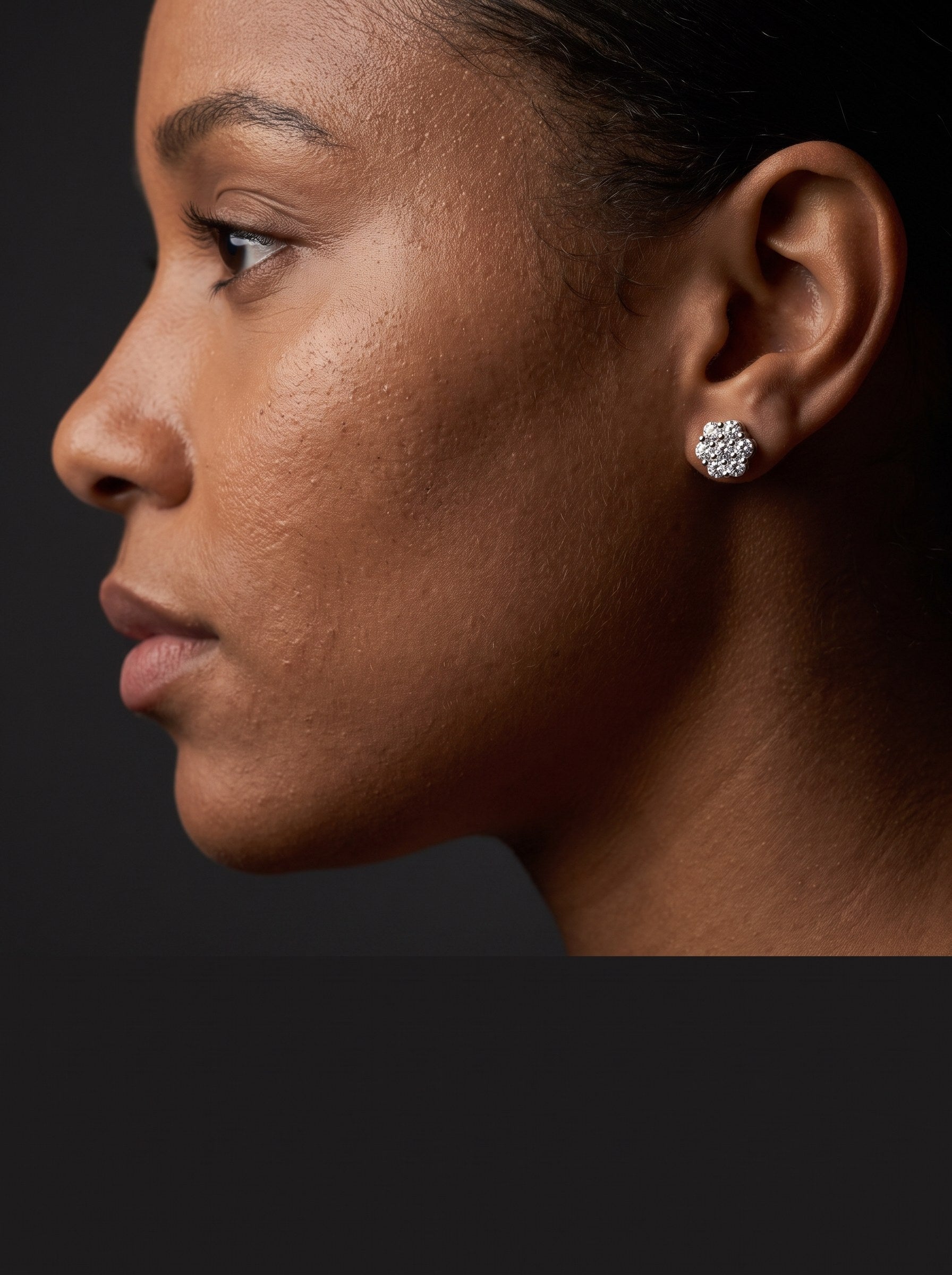 A moissanite piece worn in low light