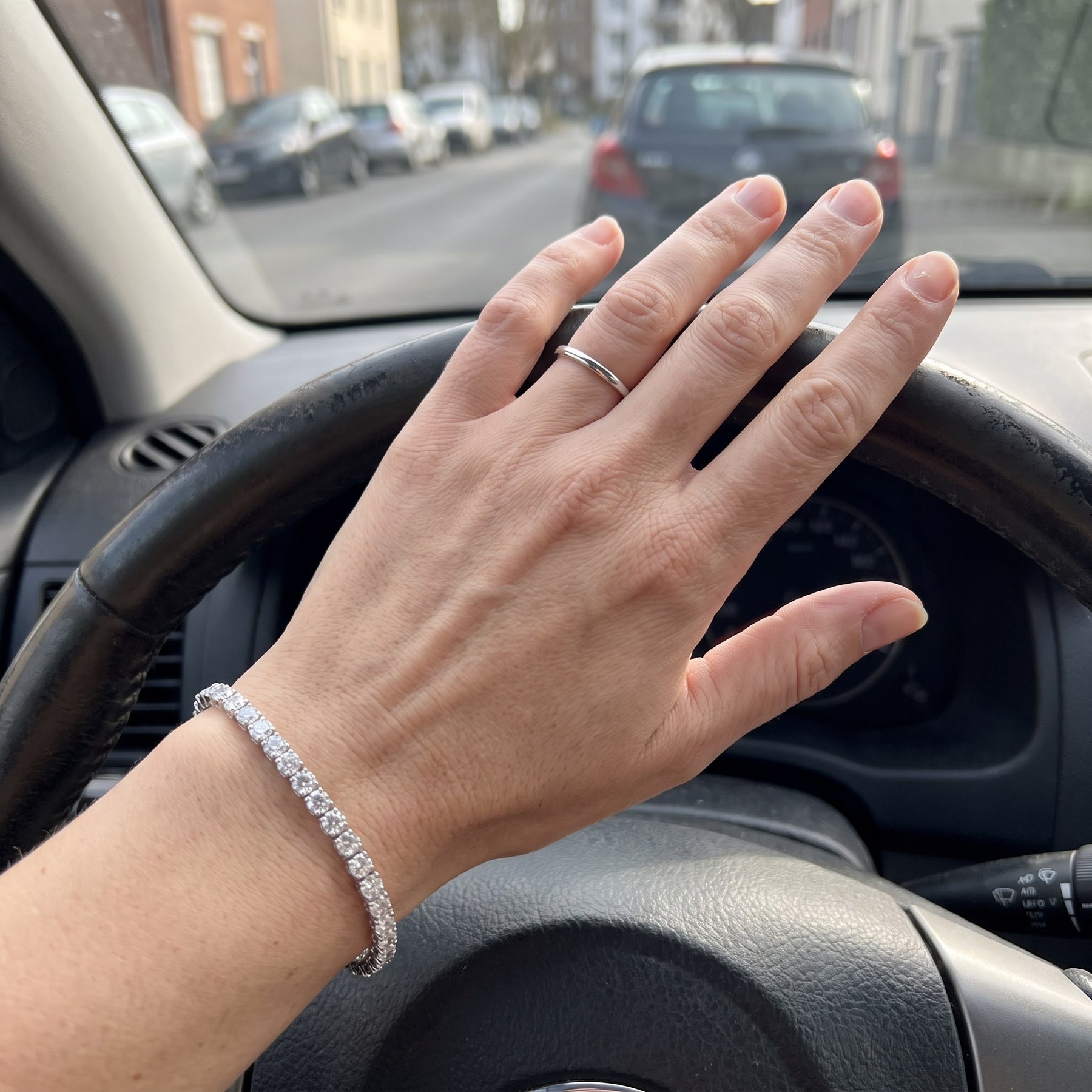 A moissanite bracelet worn on the wrist