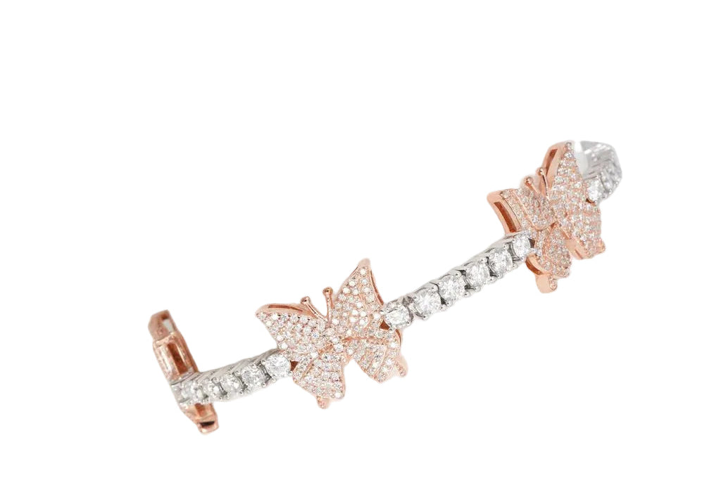 Pair of elegant Rose Gold Butterfly Tennis Bracelet - VVS Moissanite .925 Sterling Silver - Jamilah Jewels featuring shimmering butterfly accents and sparkling moissanite stones.