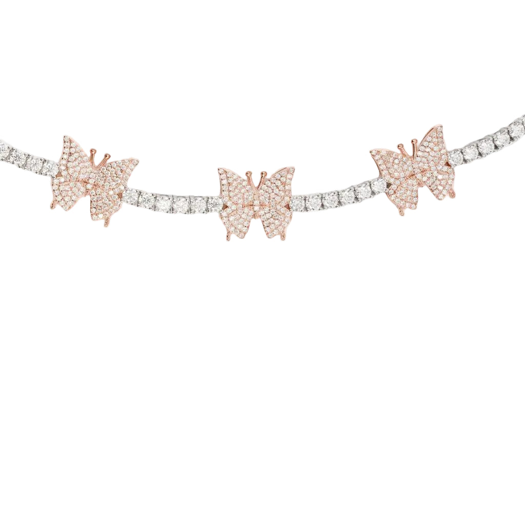 Close-up of a Rose Gold Butterfly Tennis Bracelet - VVS Moissanite .925 Sterling Silver - Jamilah Jewels featuring delicate butterfly accents and sparkling moissanite stones on a fine silver chain.