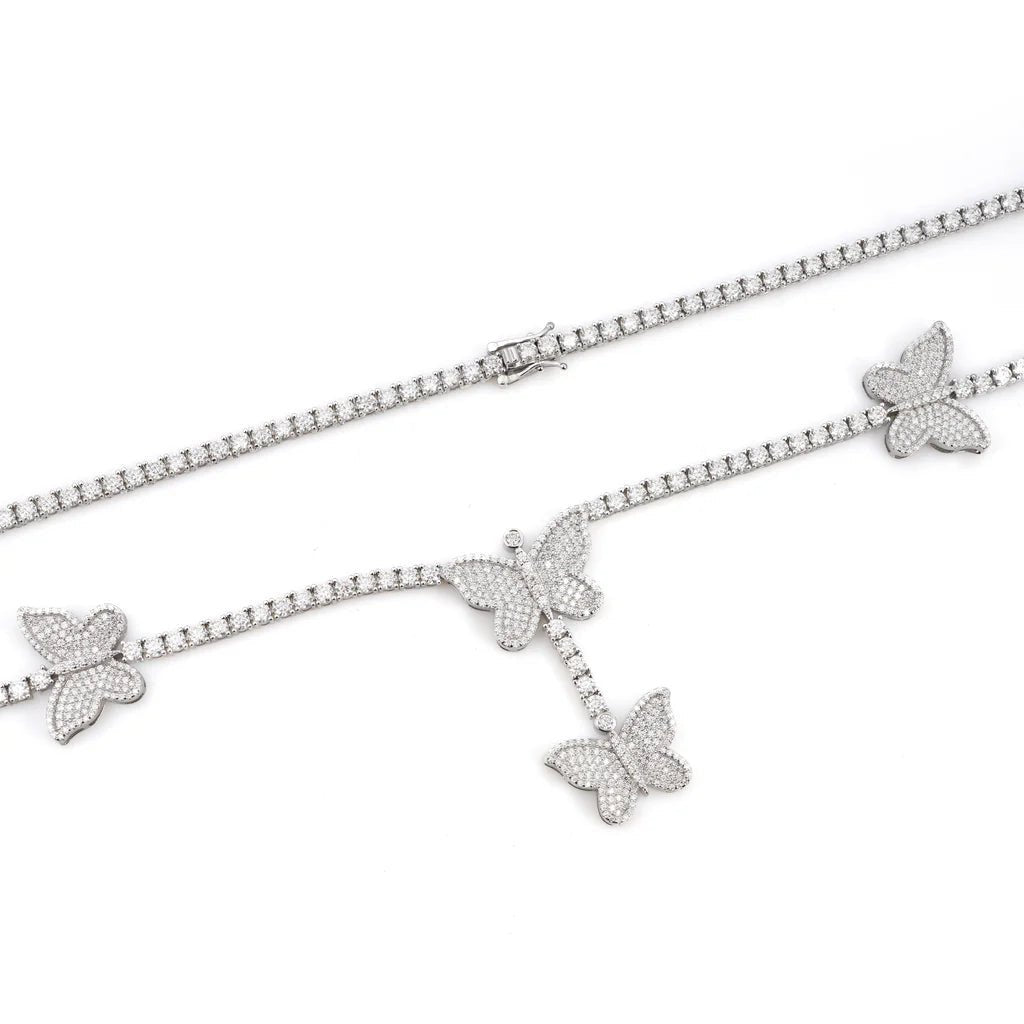 Elegant Butterfly 'Dreamline' Tennis Chain featuring sparkling moissanite stones arranged in a delicate silver setting, showcasing three intricately detailed butterfly charms.