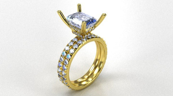 Gold ring with a gemstone on a white background
