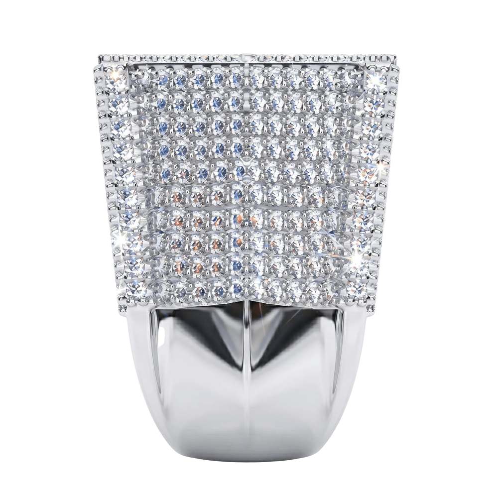 The Custom 'HK' Championship Pinky Ring by Jamilah Jewels features a wide, square silver face with multiple rows of sparkling clear gemstones, shown front-facing against a white background. Perfect as a pinky or championship ring.