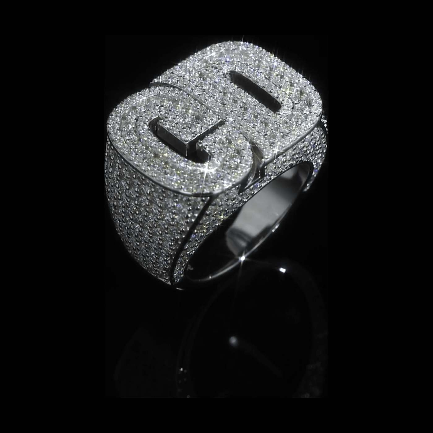 Custom GD initial pinky ring in sterling silver with VVS moissanite