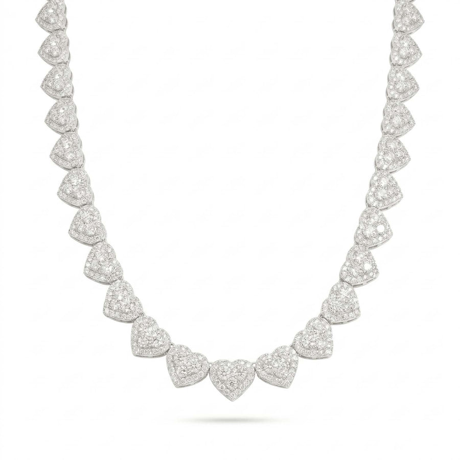 The 'Pure Affection' Linked Heart Chain is a sterling silver necklace with symmetrical heart-shaped clusters encrusted with sparkling VVS lab stones, creating an elegant and luxurious look on a white background.