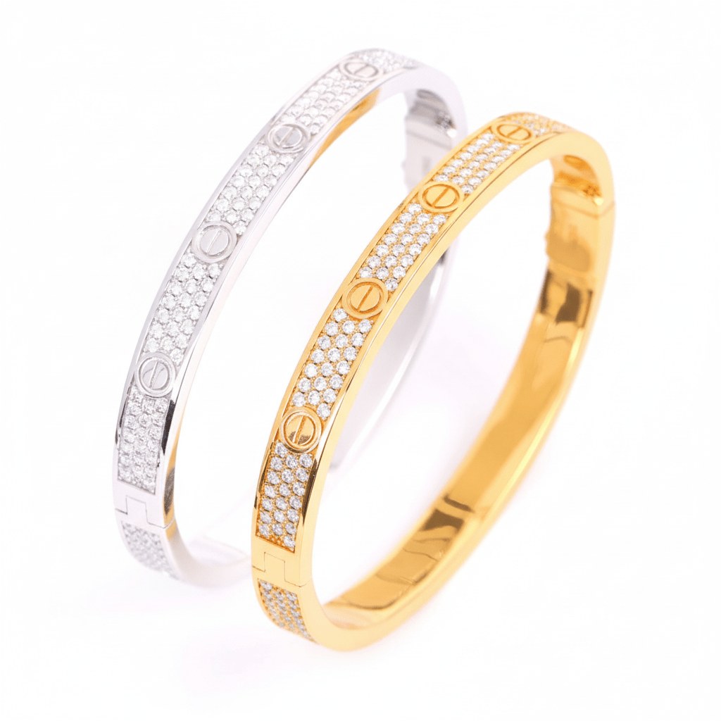 Gold and silver bangles with diamond on a white background