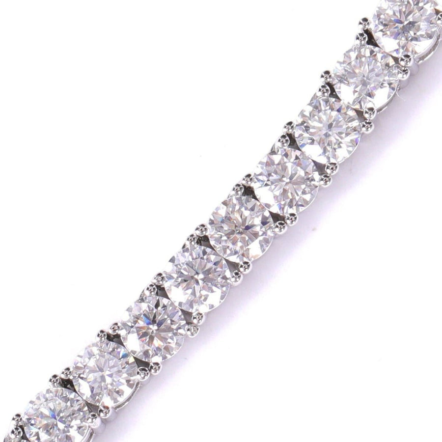 Close-up of a sparkling 4mm Tennis Chain with Round-Cut Lab Stone featuring a continuous row of brilliant round-cut lab stones set in a sleek silver design.