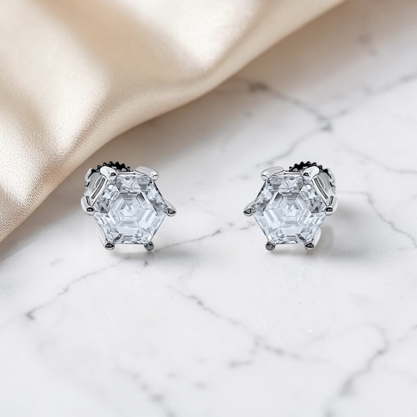 Hexagon VVS Moissanite Stud Earrings in .925 Sterling Silver on Marble - Jamilah Jewels