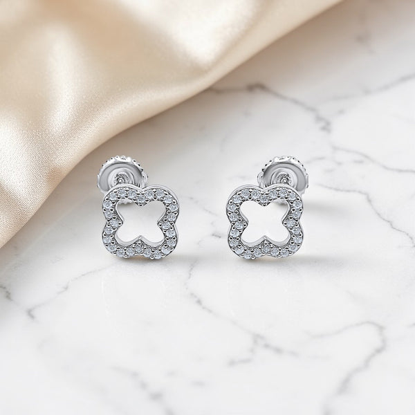 Clover VVS Moissanite Stud Earrings in .925 Sterling Silver on Marble - Jamilah Jewels
