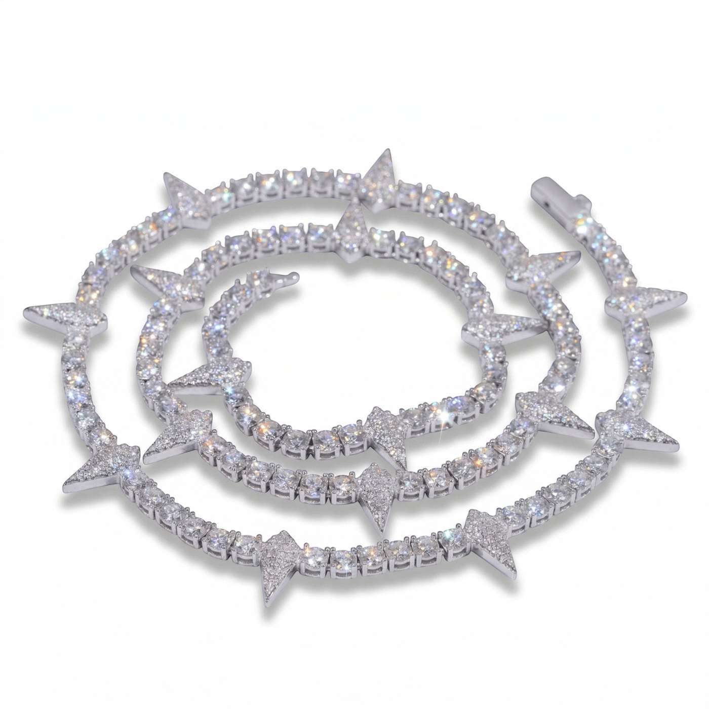 Rockstar Crown Spike Tennis Chain in silver with sparkling stones and pointed spikes arranged in a circular pattern, showcasing edgy and elegant moissanite jewelry design.