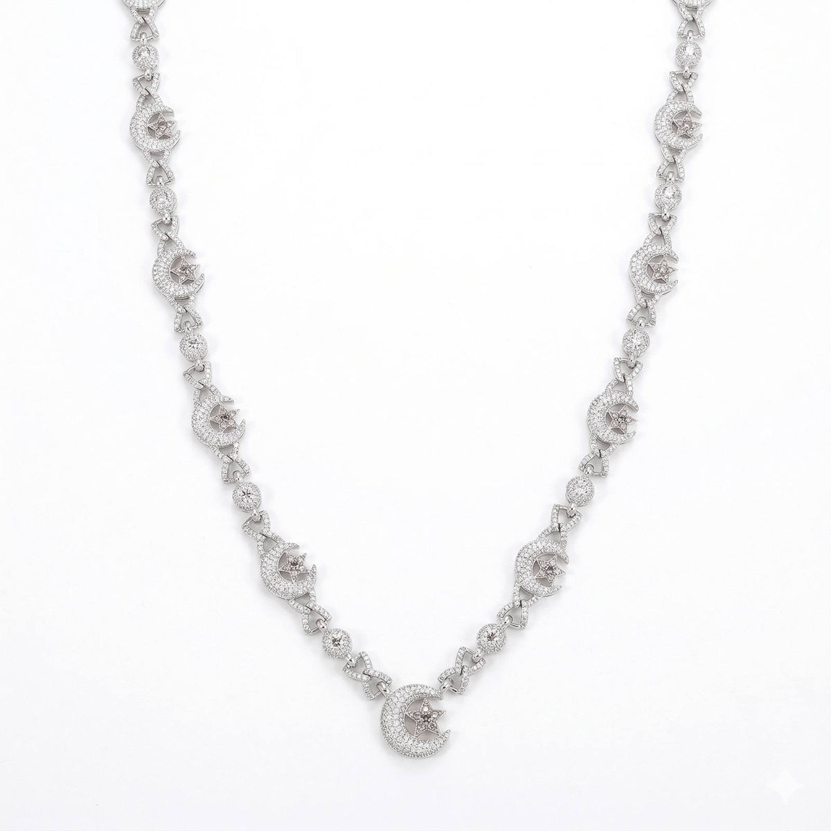 ‘Celestial Crescent’ Lunar Chain featuring delicate crescent moon and star motifs crafted in .925 silver with intricate detailing and sparkling accents.