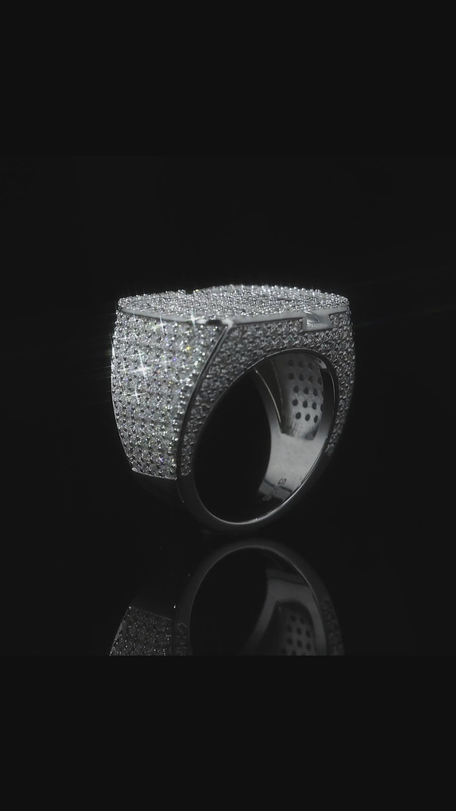 Video of the custom GD pinky ring in sterling silver with VVS moissanite, turning in the light